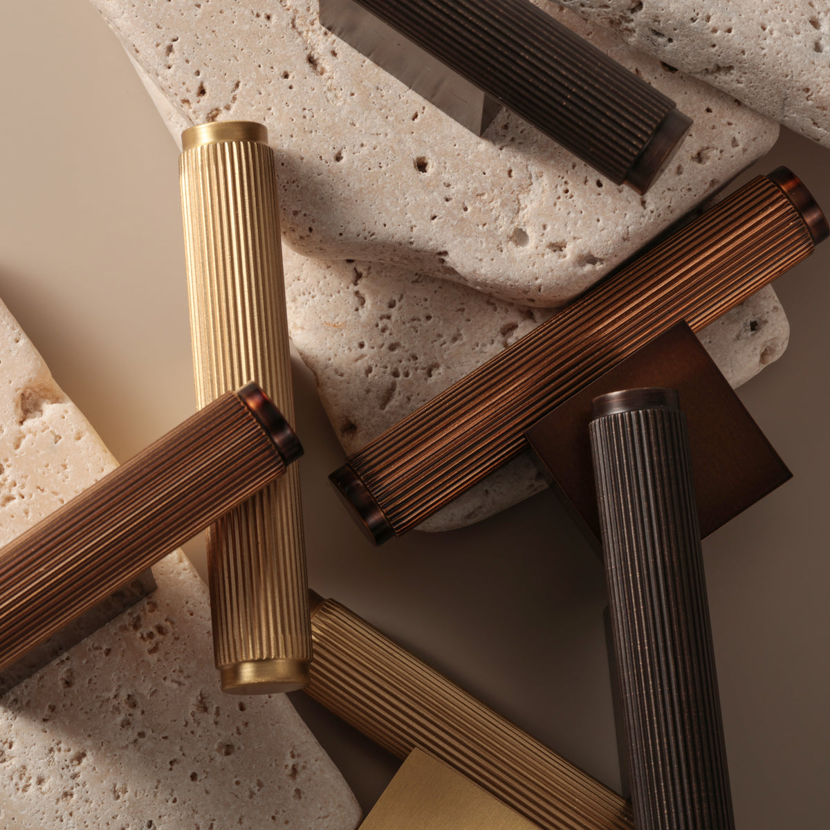 Stripe Knob detail in all finishes on travertine
