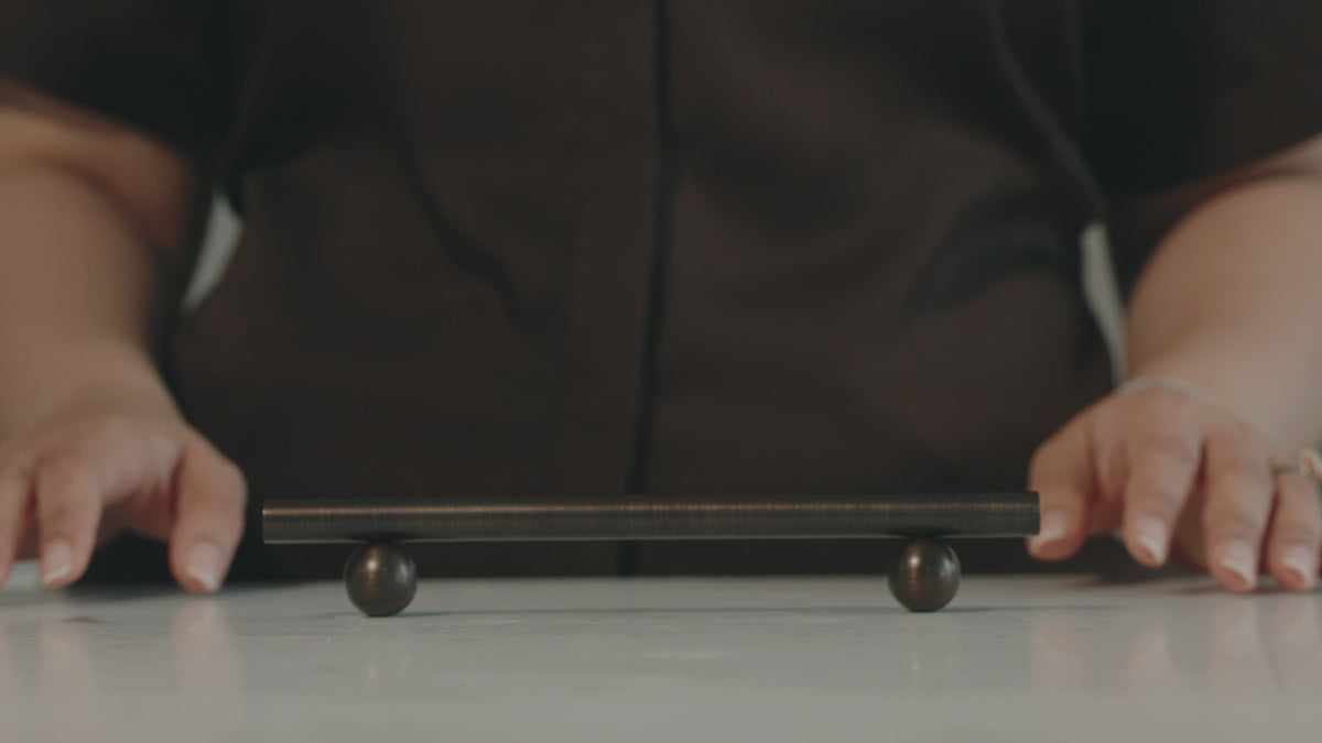 Close-up of the Flair Handle in Antique Copper Brass